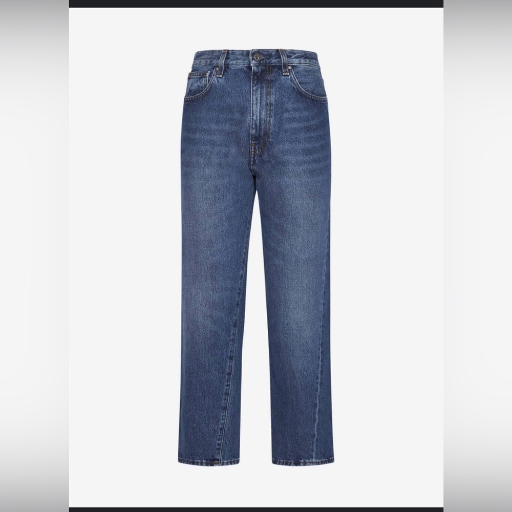 Totême twisted seam denim in medium wash